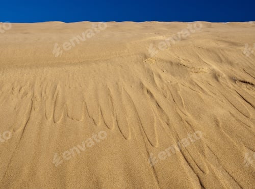 Preview: Sand Dune With Blue Sky In Desert