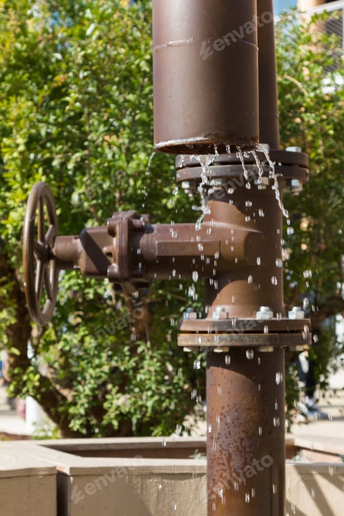 Preview: Water Trickling Out From City Pipe