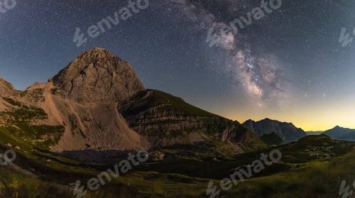 Preview: Milky Way Over The Mangart Saddle Below The Mangart Mountain. Beautiful Night Scene In Julian Alps