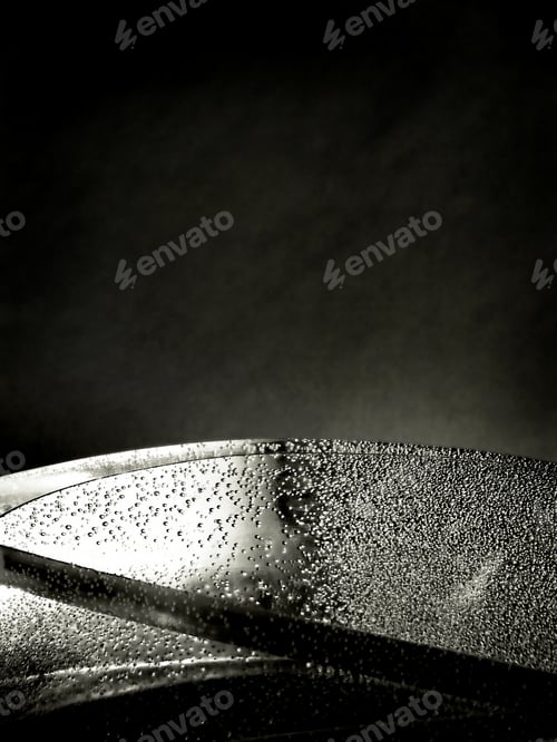 Bubbles Inside a Glass Against Dark Background