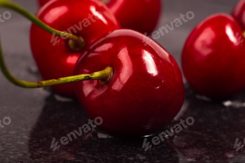 Preview: Large Ripe Red Sweet Cherries In A Black Dish, Close-Up