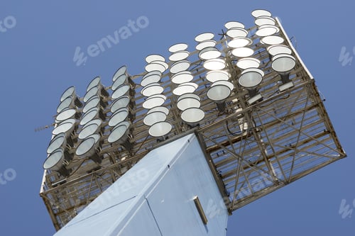Preview: Closeup Of A Stadium Lights With Blue Sky.