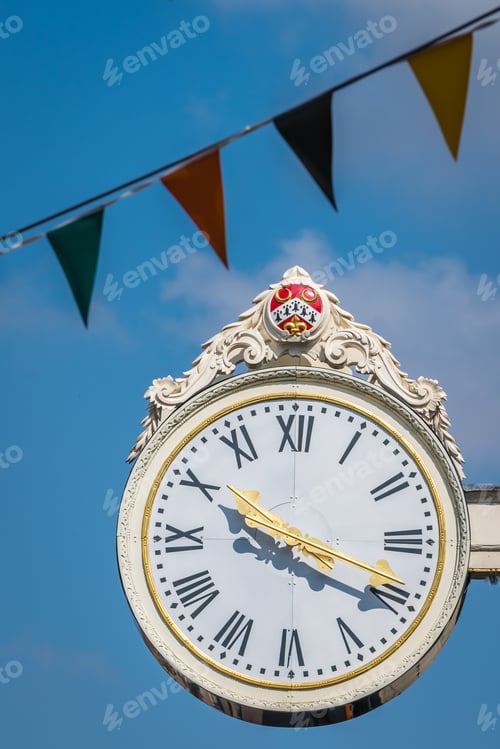 Preview: Old Antique Clock Protruding From A Building In Rochester Town, Kent, Uk