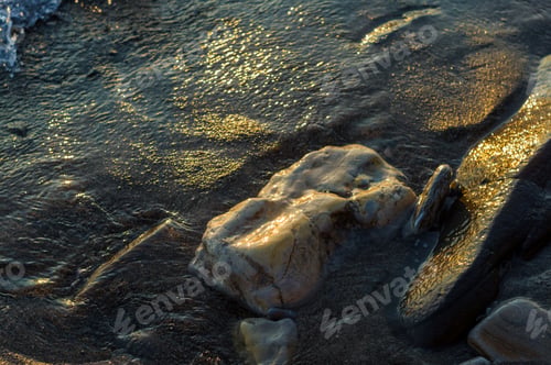 Preview: Pebble Stones On The Sea Beach, The Rolling Waves Of The Sea With Foam