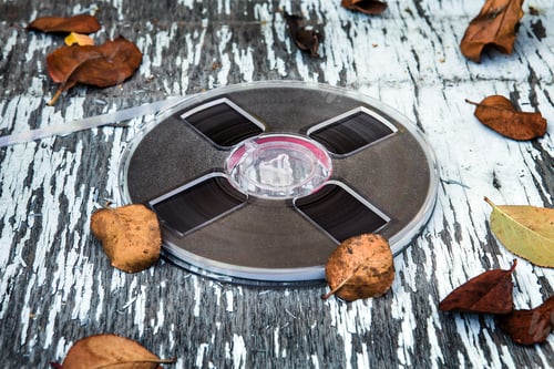 Preview: Vintage Reel With A Tape On The Old Table Outdoor Closeup