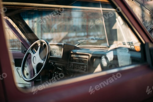 Preview: Old Vintage Car On The Street Near The Garage. Details Of A Car Standing On A Sunny Day On The