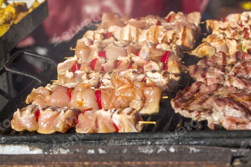 Preview: Different Kind On Grilled Meat And Sausages With Smoke And Steam From The Grill