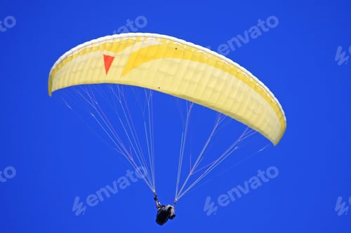 Preview: Paraglider In A Blue Sky