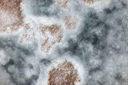 Preview: Aerial View Over The Frozen Surface Of Lake
