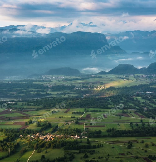 Preview: Villages And Fields At Sunrise On A Misty Day