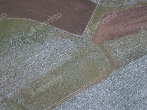 Preview: Aerial View Of Agricultural Fields With Snow Cover In Winter