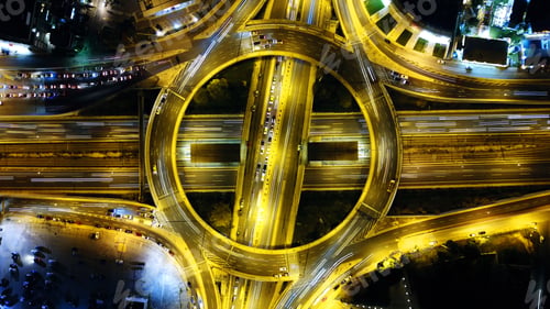 Preview: Aerial Drone Slow Shutter Night Shot Of Urban Elevated Toll Ring Road Junction And Interchange