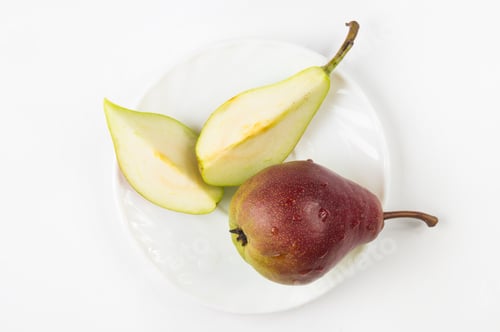 Preview: Colorful Pears And Slices In The Dish On A White Background