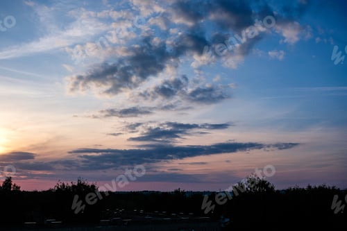 Preview: Dramatic Sunset With Clouds Over The City Rooftops, Riga, Latvia