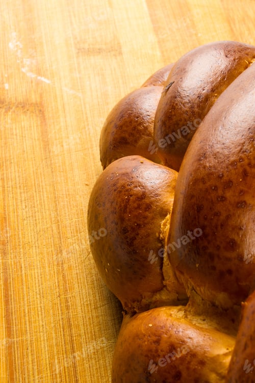 Preview: Chunks Large Braided Loaf On Wooden Background