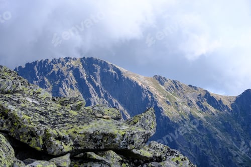 Preview: Rocky Sharp Mountain Tops In Tatra Mountains In Slovakia With Clouds And Mist From Above And Rain