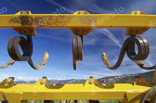 Preview: Tool For Agricultural Tillage Yellow And Blue Sky.