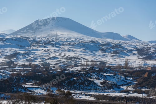 Preview: Winter Scene With Volcanic Mountains And Village