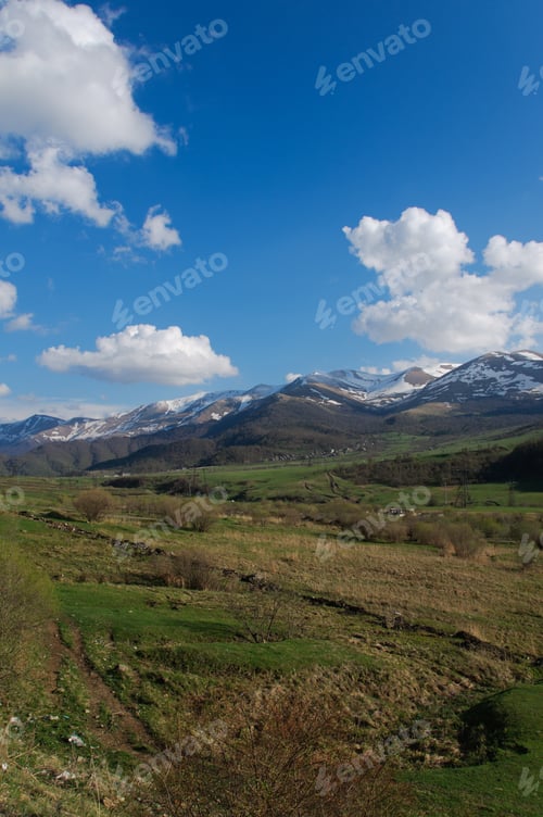 Preview: Spring Landscape With Fluffy Clouds