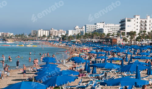 Preview: Protaras, Cyprus - July 8 2013: Tourists At Protaras Bay Beach Relaxing And Enjoying Their Summer
