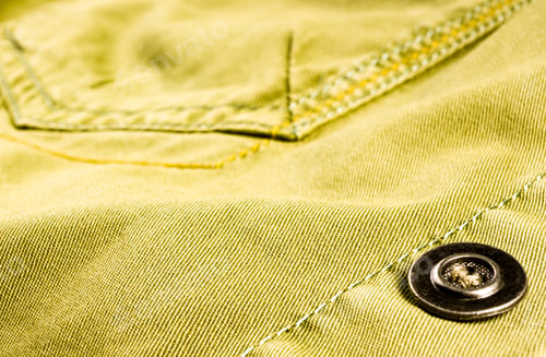 Preview: Clothing Items Stonewashed Cotton Fabric Texture With Seams, Clasps, Buttons And Rivets, Macro