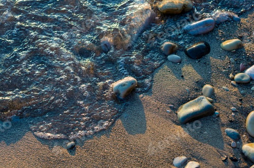 Preview: Pebble Stones On The Sea Beach, The Rolling Waves Of The Sea With Foam