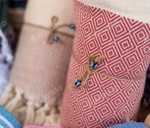 Preview: Rolled Stylish Comfort And Colourful Blankets Stored On Top Of Each Other. Rolled Blankets In A
