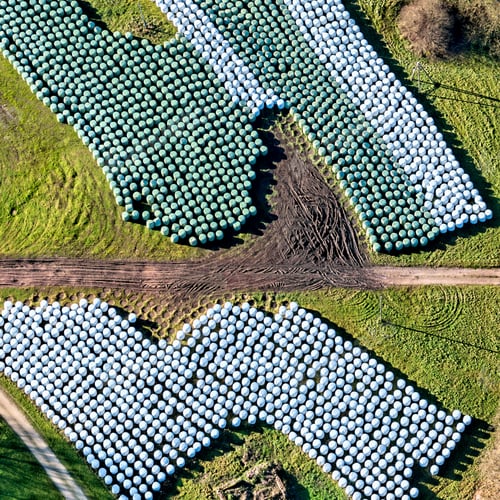 Preview: Aerial View Over The Stock Of Hay In Rolls