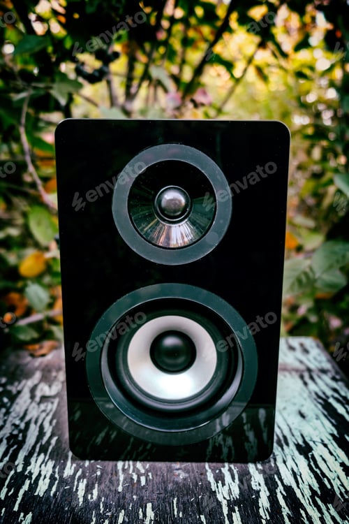Preview: Loudspeaker Box On The Weathered Wooden Table Closeup