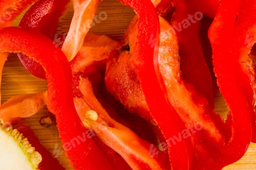 Preview: Sliced Fresh Red Paprika, Bell Pepper On Bamboo Cutting Board