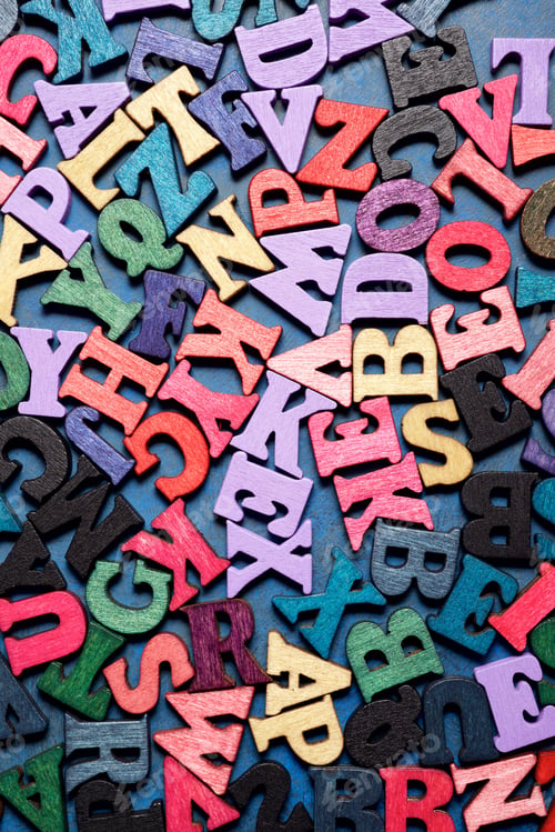 Preview: Wood Letters On A Blue Table.