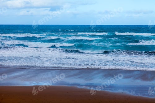 Preview: The Picturesque Line Of A Surf On The Sandy Beach On The Seashore. Waves At The Coast.