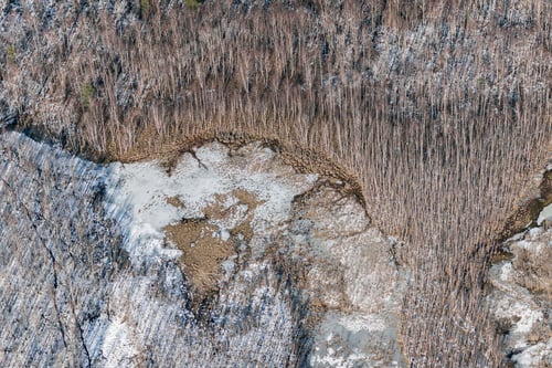 Preview: Aerial View Over The Small River In Winter Time