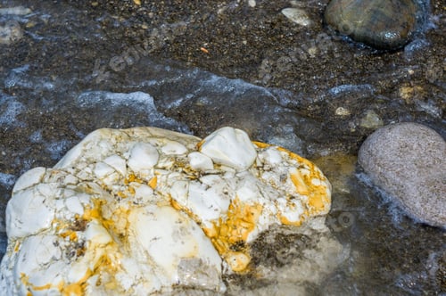 Preview: Pebble Stones On The Sea Beach, The Rolling Waves Of The Sea With Foam