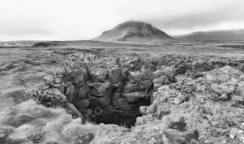 Preview: A 'Blow-Hole' In Sea Cliffs At Arnarstapi In Iceland. A High Contrast Monochrome Edit.