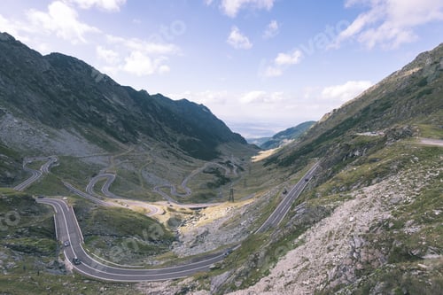 Preview: View To The Carpathian Mountains War Road Transfagarasan From The Top With Lonely Trees And Clouds