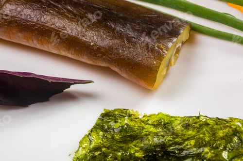 Preview: Smoked Garfish With Lime, Basil, Green Onions, Chili, Nori Chips, Spices, Olive Oil In A White