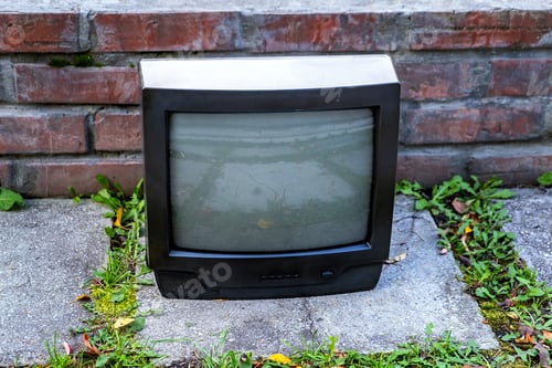 Preview: Old Analog Television Set On The Street Outdoor