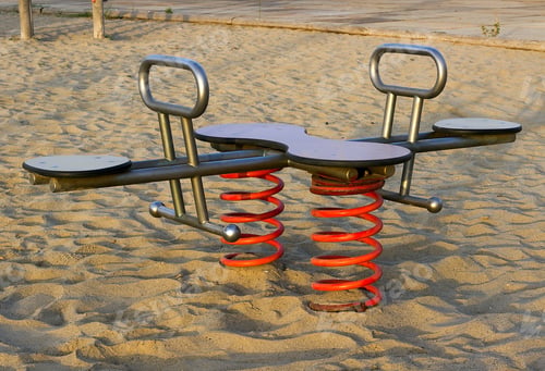 Preview: Empty Swings Spring In Children Play Area At Park