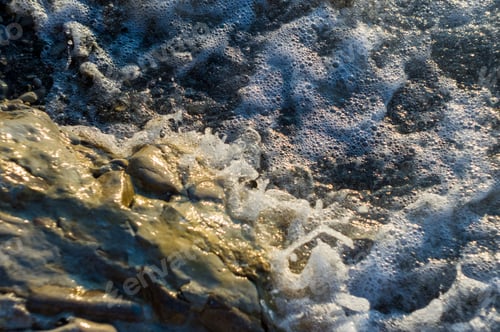Preview: Pebble Stones On The Sea Beach, The Rolling Waves Of The Sea With Foam