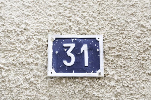 Preview: Number Thirty-One On A Wall, Detail Of A Wall Of A House With A Number Of Information