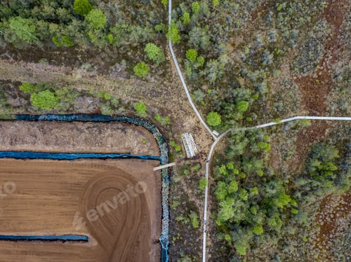 Preview: Drone Image. Aerial View Of Swamp Area With Foot Walk Trails. Latvia