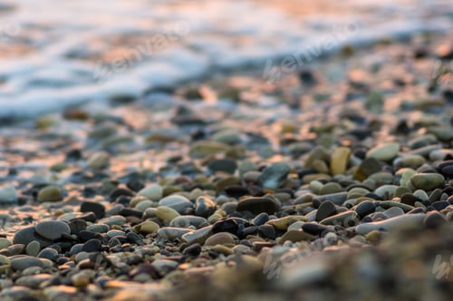 Preview: Pebble Stones On The Sea Beach, The Rolling Waves Of The Sea With Foam