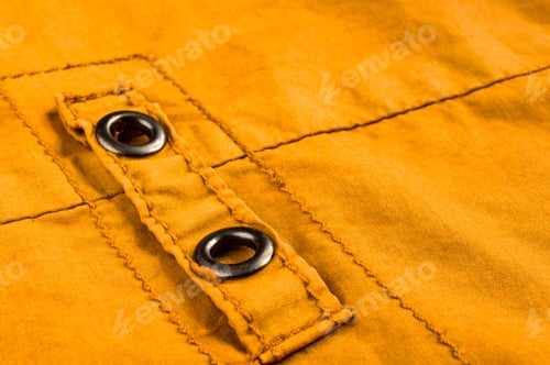 Preview: Clothing Items Stonewashed Cotton Fabric Texture With Seams, Clasps, Buttons And Rivets, Macro