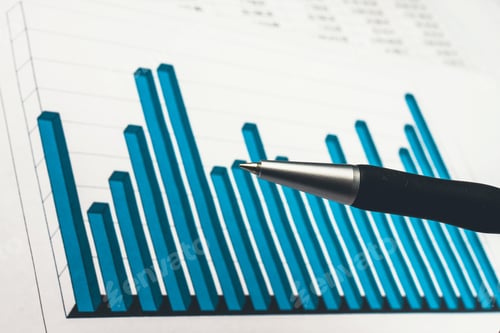 Preview: Businessman Showing A Diagram On A Financial Report Using A Pen