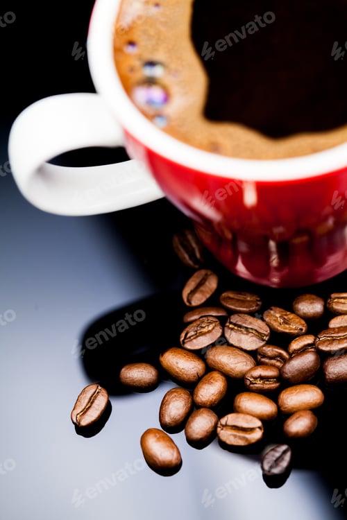 Preview: Red Cup Of Coffee With Coffee Beans And Dark Background