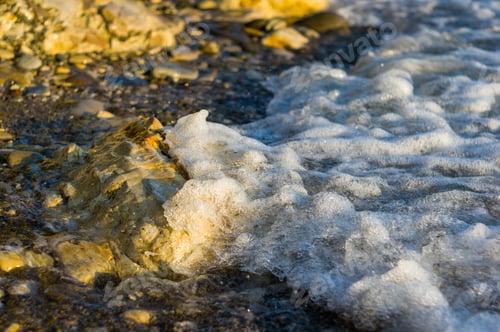 Preview: Pebble Stones On The Sea Beach, The Rolling Waves Of The Sea With Foam