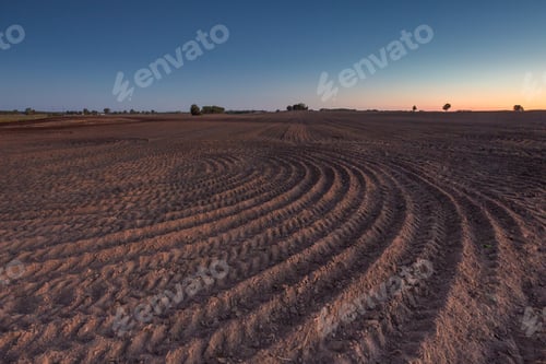 Preview: Beautiful Landscape With Plowed Field Under Sunset Or Sunrise Sky. Agriculture Of Poland.