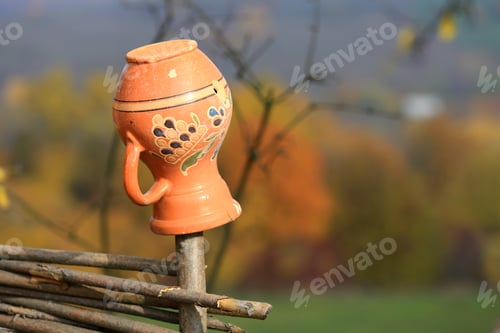 Preview: Clay Jug On Wooden Fence, Take It In Ukraine