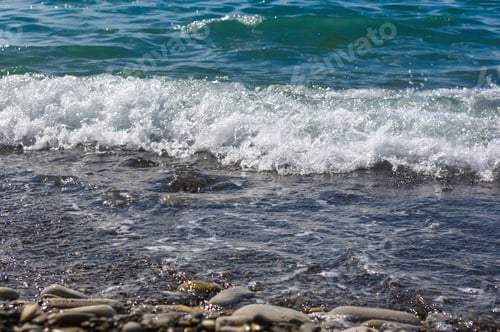 Preview: Sea Pebble Beach With Multicoloured Stones, Transparent Waves With Foam, On A Warm Summer Day
